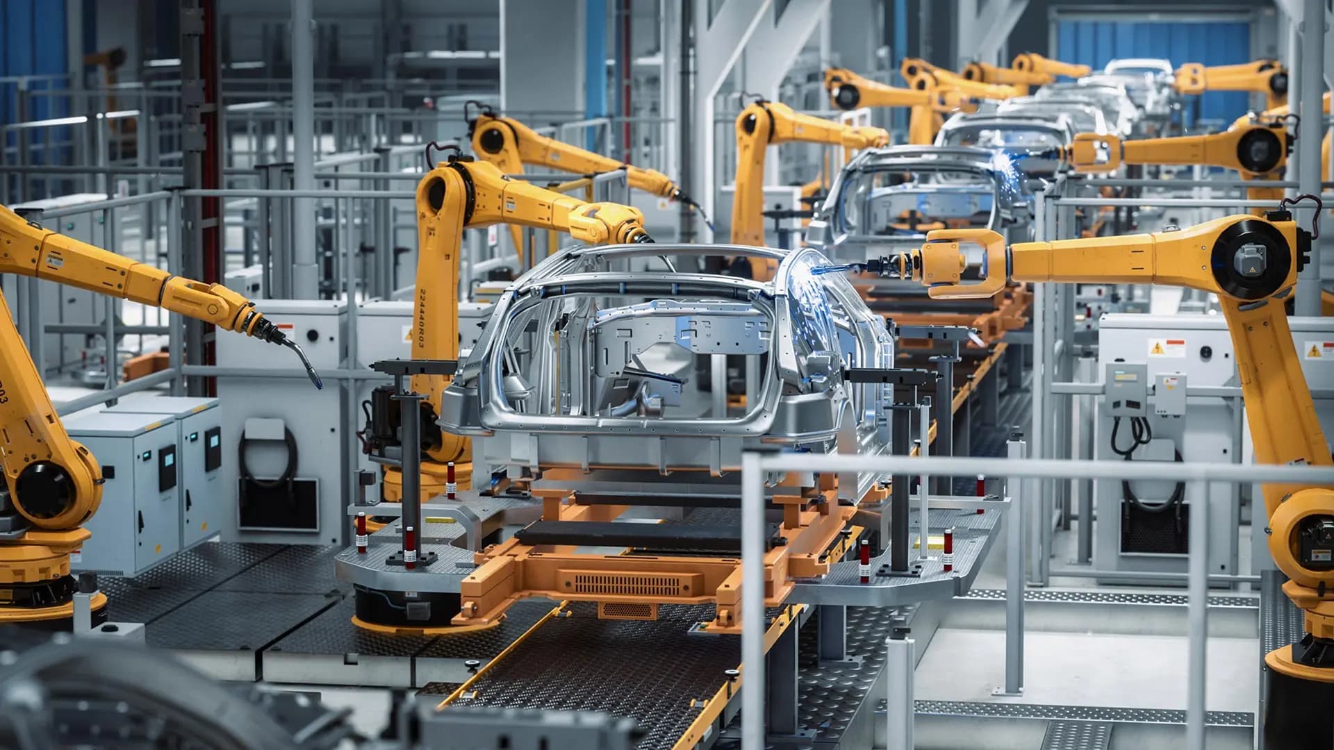 Car factory with robotic arms